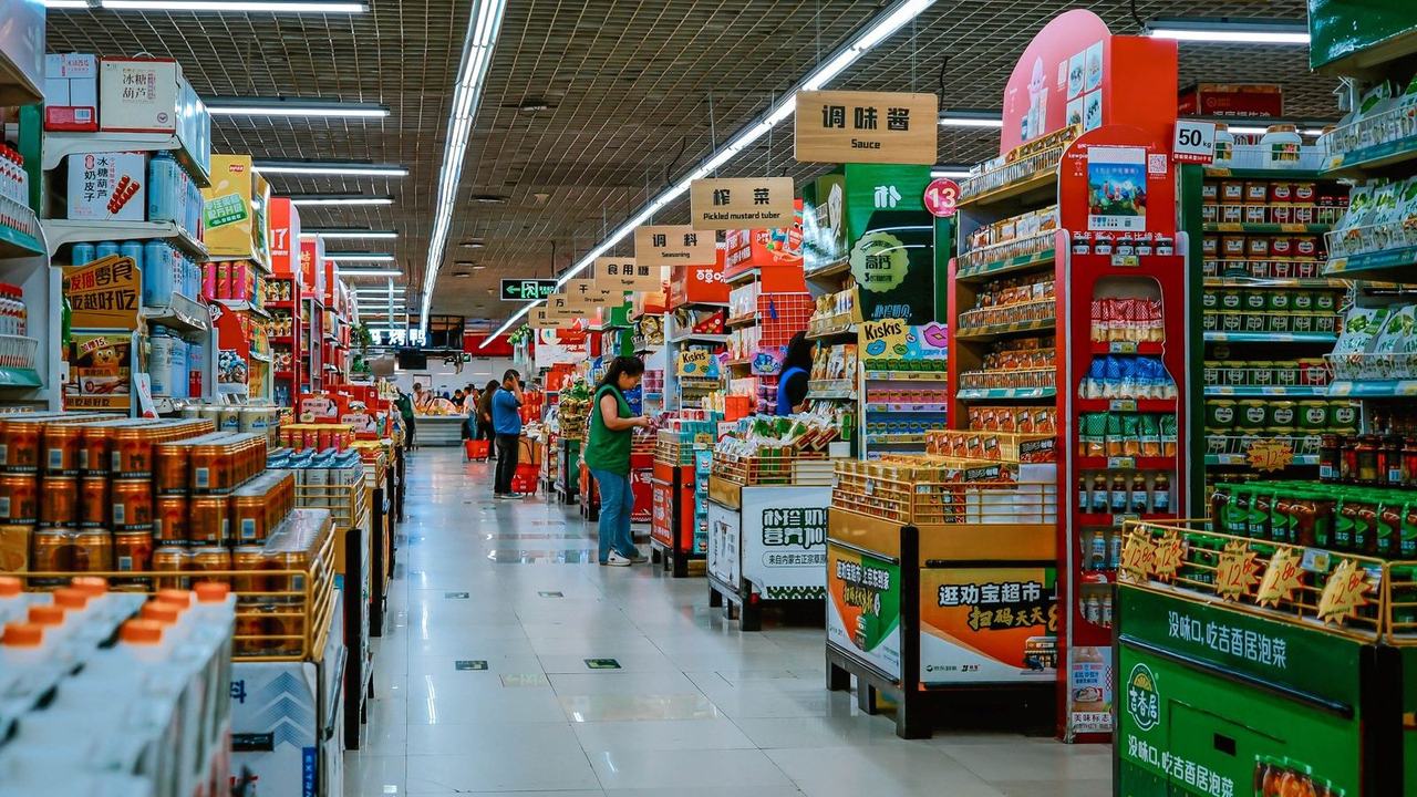 Supermarket aisle with shoppers