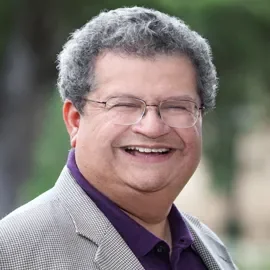 Dr. Huggy Rao